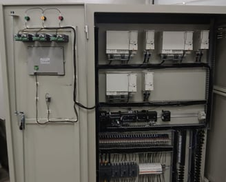 a large electrical cabinet with a lot of wires and wires