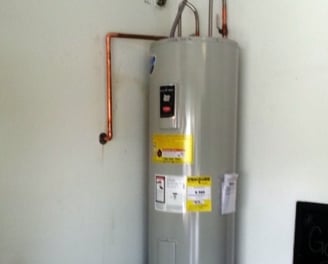 a water heater with a water heater on top of it