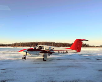 Picture of C-GBJJ, a PA44 shining in the golden hour