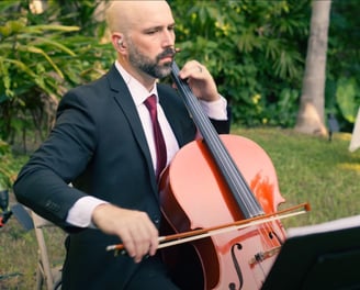 Treavor Eaton Music playing his cello at a wedding