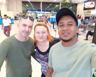 Nobel Travels Lanka airport shuttle guest smiling with driver