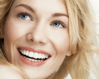 a woman with blonde hair and blue eyes