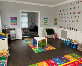 Photo of daycare room where children play.