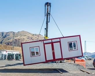 This image shows a high-quality prefabricated porta cabin designed for use as temporary site office.