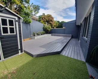 Tractio deck boards, Clever Cladding Planters and artificial grass