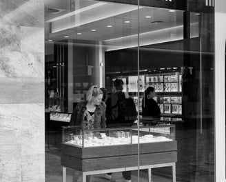 A woman in a jewellery store by the lens of Peter Pickering