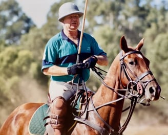 Laurie Connell playing polo at King's Meadow by Peter Pickering