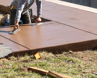 a man is using a sanded in concrete