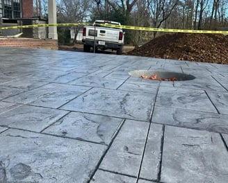 a fire hydrant sitting on a driveway