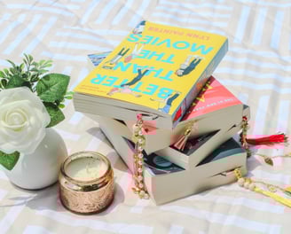 a stack of books with charmed unique bookmarks