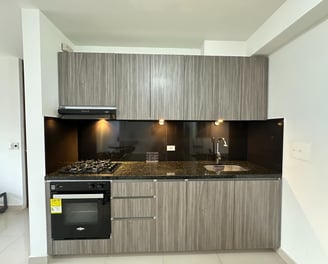 a kitchen with a stove top oven and a stove top oven