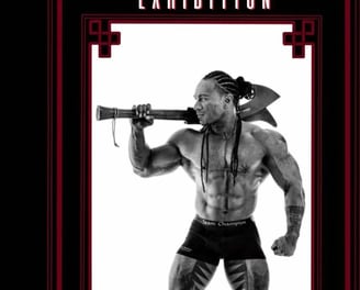 Polynesian tattoo artist bodybuilding fitness m,odel carl cocker with Tongan war club
