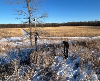 Trimble R12i with TSC7 in the winter overlooking prarie