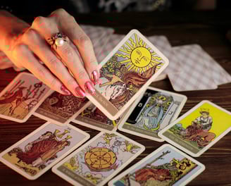 a person holding a deck of cards with a deck of cards