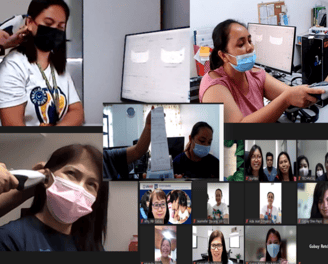 a group of people wearing masks on a video conference