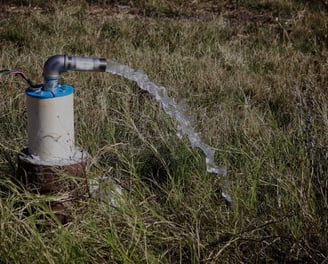 a water hose is being used to collect water