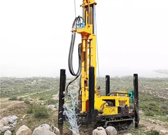 a drilling rig with a drilling machine