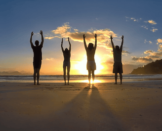 Yoga body movement on the beach for personal wellness during sunrise