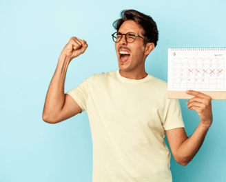 a man with glasses and a calendar calendar