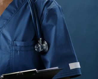 a dentist in blue uniform