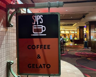 sign with coffee cup for Sips coffee & gelato in reno, nv