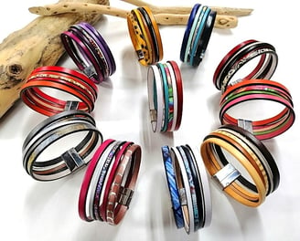 a circle of bracelets with different colored bands