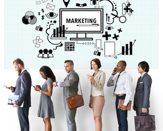 a group of people standing in line with a business man