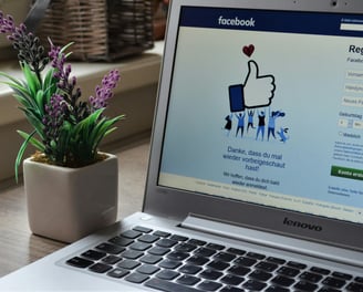 a laptop computer screen with a facebook like facebook like facebook