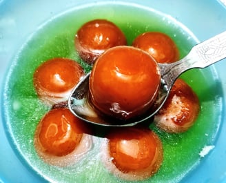 gulab jamun a sweet made with milk product and sugar syrup