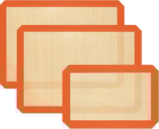 a set of three silicone cookie sheets