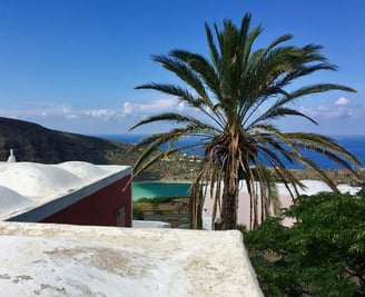 Traditional house in Bugeber with lake view, green hills and clear sky