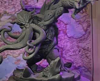 a statue of a dragon with a dragon on it