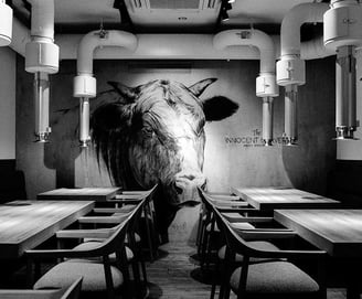 a bull head on mural painting in a restaurant, Tokyo