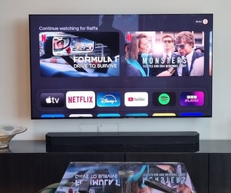 TV mounted on a plasterboard wall using a Vogels Motorised TV mount. All cables hidden