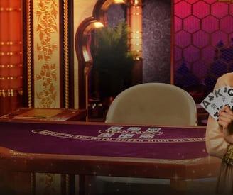 a woman holding a card game in front of a casino table