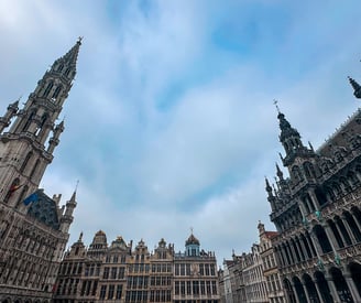 a large building with a clock tower in the middle of it