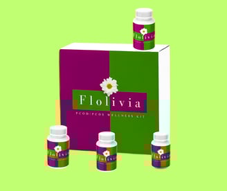 Flolivia PCOD/PCOS Wellness Kit with herbal supplement bottles displayed against a bright green back