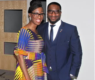 a man and woman standing next to each other