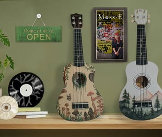 A hand-painted ukulele and records and CDs for sale in Moss.E's shop