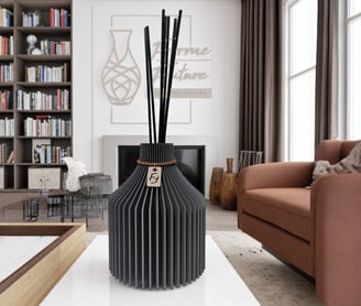a vase with sticks sticking out of it
