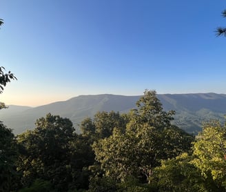 a mountain view of a mountain range in the distance