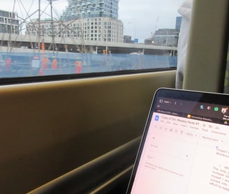 a laptop computer sitting on a table with a laptop on it