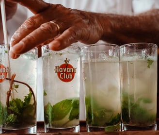 Bartender making Mojitos