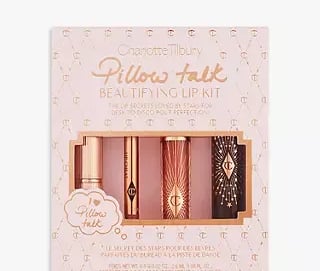 a set of three lip smackers in a box