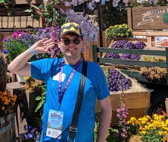 Caddy Standing in Front of Knott's Berry Farm Entrance