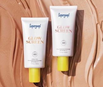 two sunscreens of sunflowers and a bottle of sunscreene