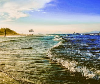 Golden sunset at the beach, a vibrant symbol of life's love and joy.