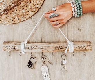 boho girl hand holding key organizer