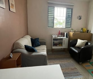 a living room with a couch and a table