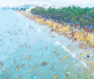 a beach scene with a large amount of people on the beach